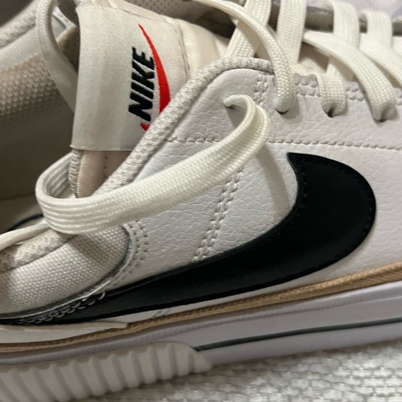 Nike White Sneakers with Black Swoosh - Picture 1 of 3
